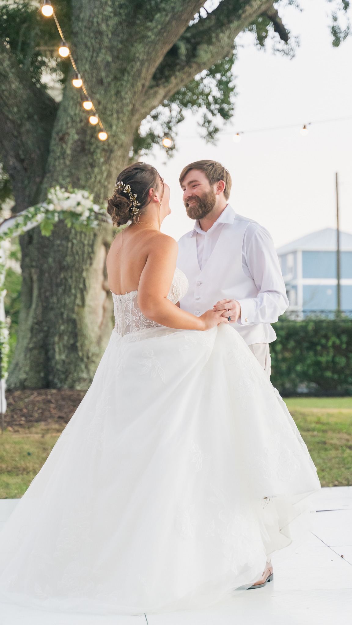 First dance photo of bride and groom at wedding in Gulfport, Mississippi.