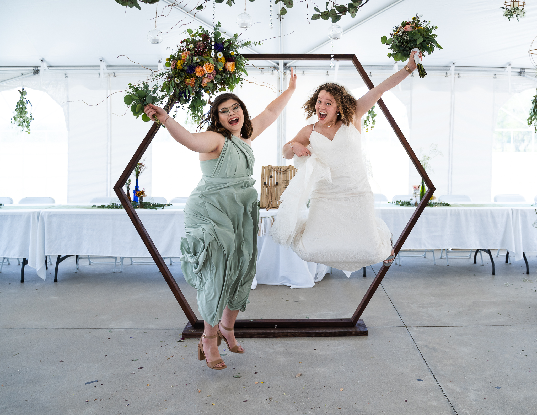 Bridal party enjoying portraits at summer wedding in Central Mississippi